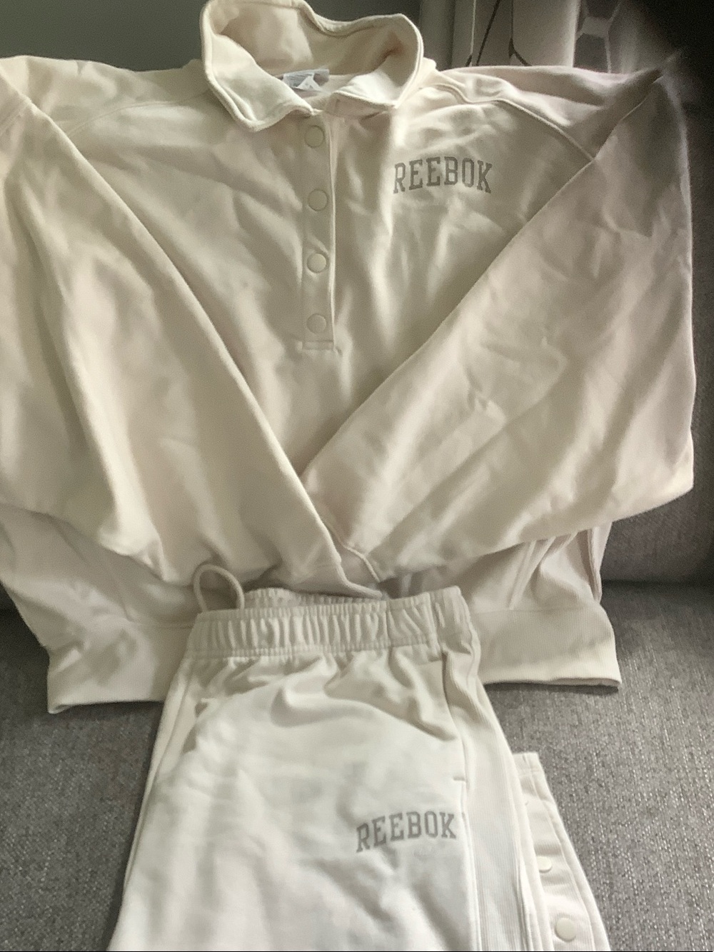 Reebok woman’s two piece cream jogging set